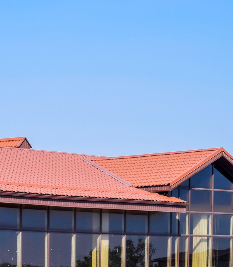 A building with a red tilted roof